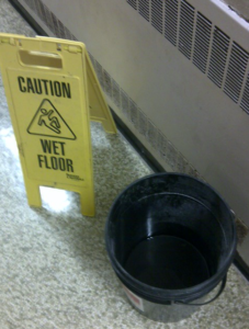 bucket w/caution sign