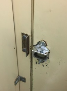 broken lock on bathroom stall