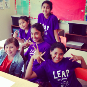 Group of kids in "LEAP" shirts